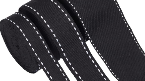 black ribbon with white stitching